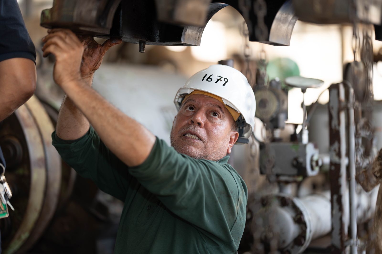 Maintenance technician working on heavy plant machinery